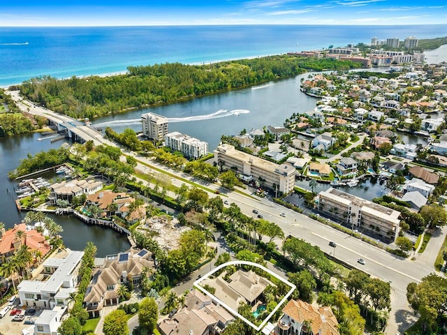 birds eye view of property featuring a water view