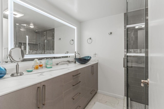 bathroom with vanity and walk in shower