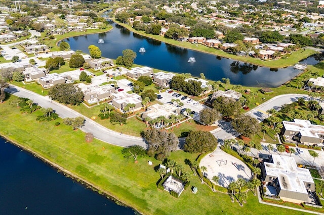 drone / aerial view with a water view