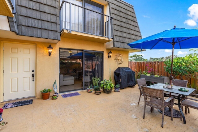 view of patio with a grill