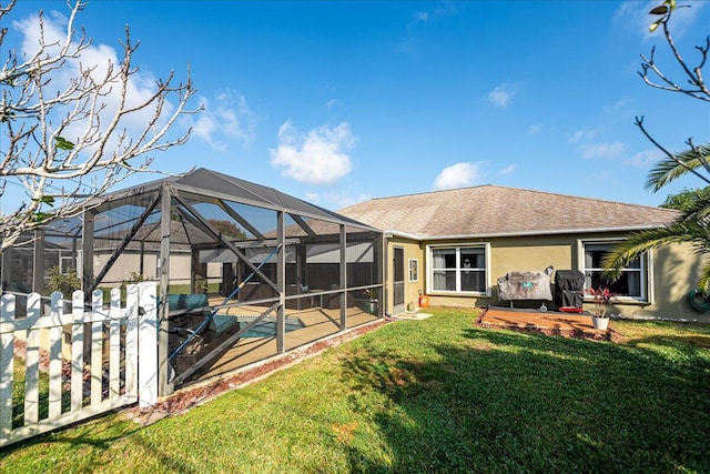 back of house featuring a patio, a lanai, a swimming pool, and a lawn