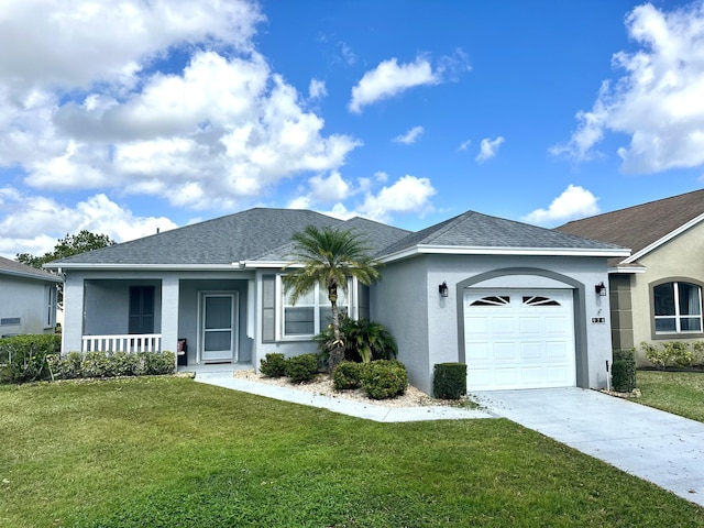 ranch-style house with a garage, a front yard, and covered porch