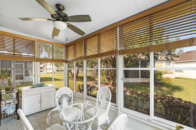 sunroom with a ceiling fan