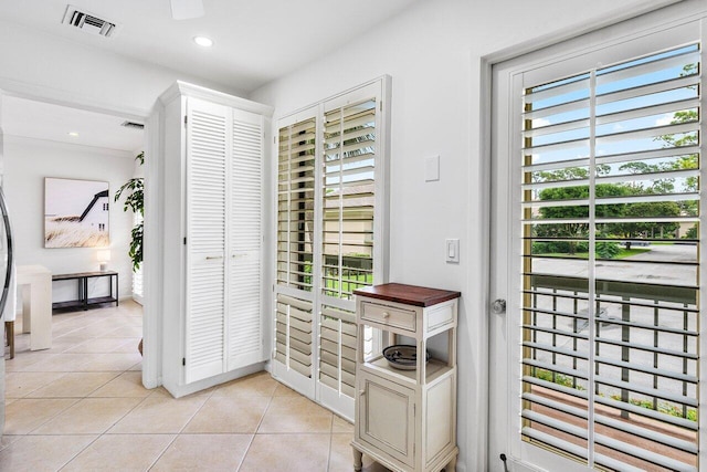 interior space with light tile patterned floors