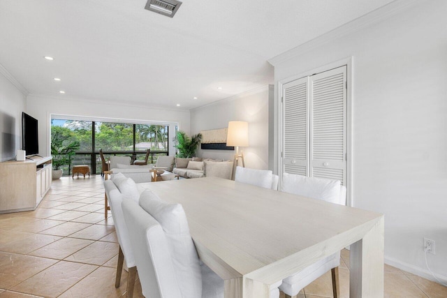 tiled dining area with ornamental molding