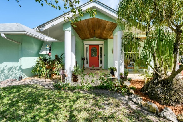 doorway to property featuring a porch