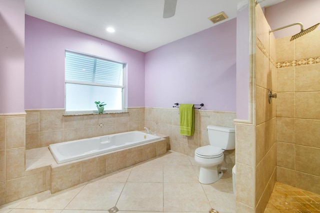 bathroom featuring visible vents, toilet, tile patterned floors, a tile shower, and a bath