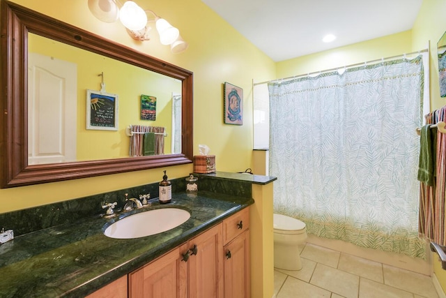 full bath featuring vanity, shower / bath combination with curtain, tile patterned flooring, and toilet