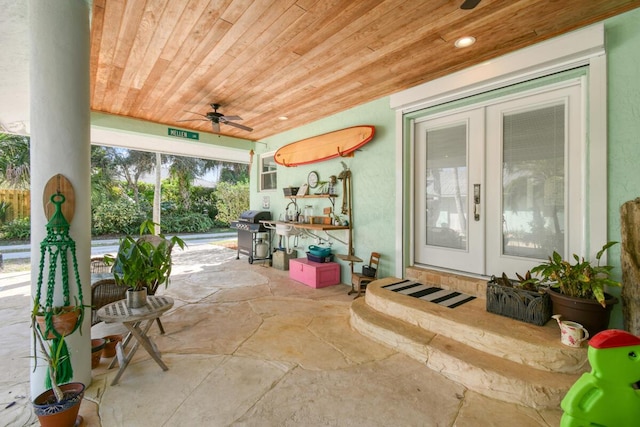 view of patio with a ceiling fan and grilling area