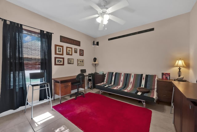 bedroom featuring light tile patterned floors and ceiling fan