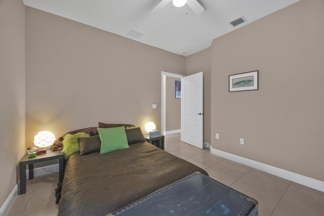 bedroom featuring ceiling fan and tile patterned flooring