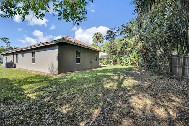 view of yard featuring central AC