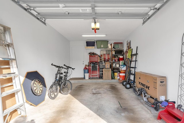 garage featuring a garage door opener