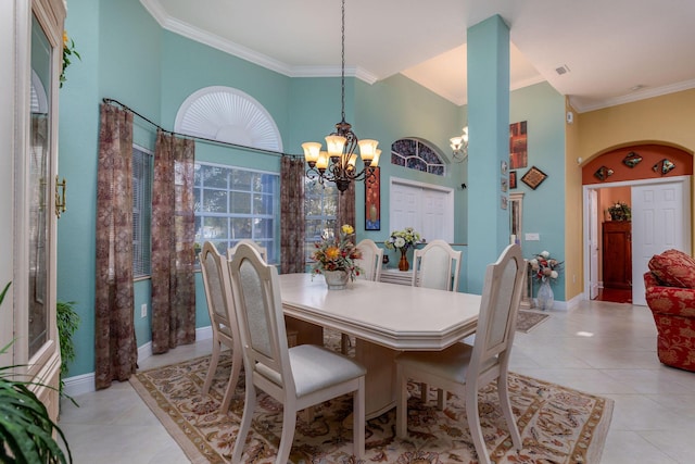 dining room featuring ornamental molding, arched walkways, a high ceiling, and light tile patterned floors