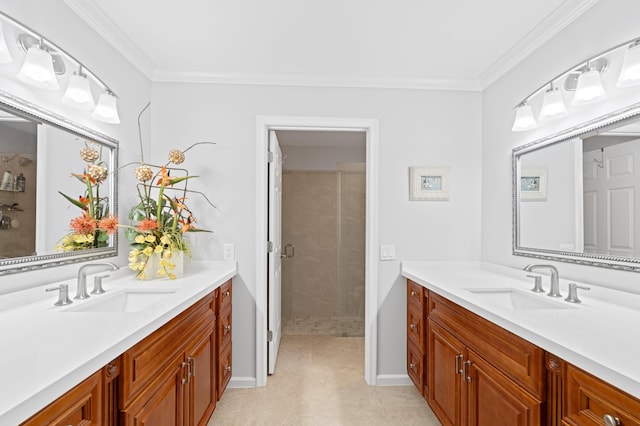 bathroom with vanity, crown molding, and a shower with shower door