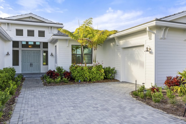 exterior space with a garage