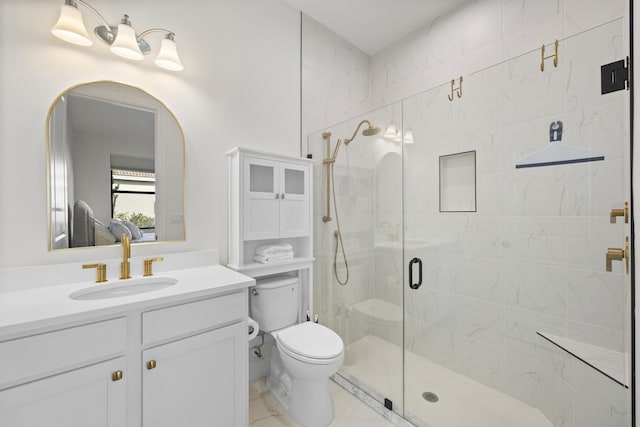 bathroom with toilet, a stall shower, marble finish floor, and vanity