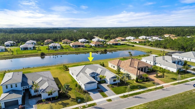 aerial view with a water view and a residential view