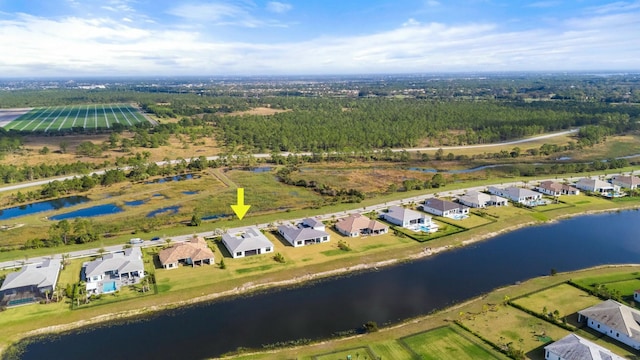 aerial view featuring a water view and a residential view