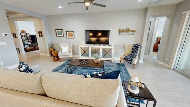 living room with ceiling fan