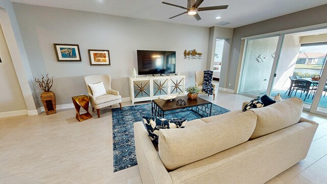 living room featuring ceiling fan