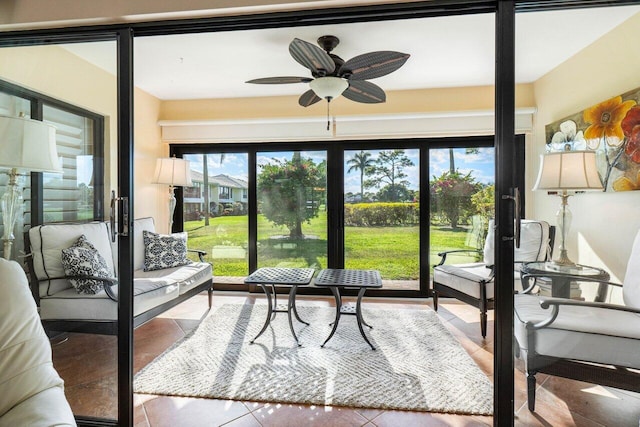 sunroom / solarium with ceiling fan