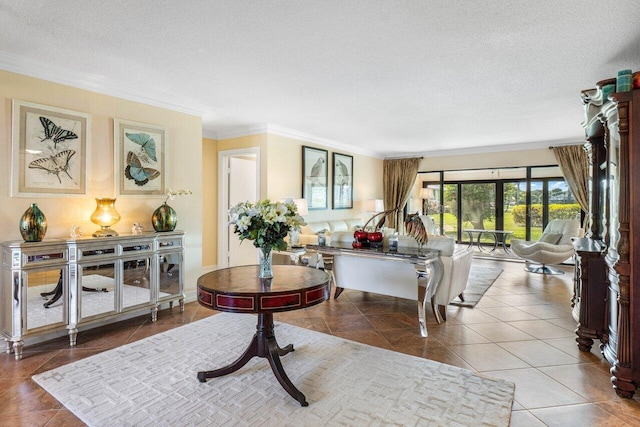 interior space with ornamental molding, tile patterned flooring, and a textured ceiling