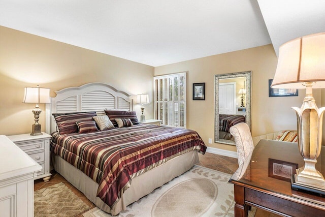 bedroom with light tile patterned flooring