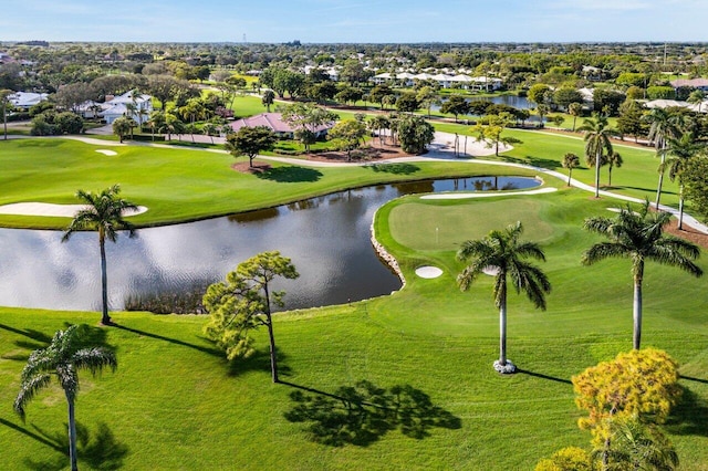 surrounding community with a water view