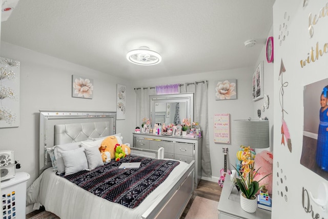 bedroom with a textured ceiling