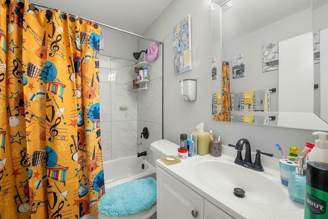 full bathroom featuring vanity, shower / tub combo, and toilet