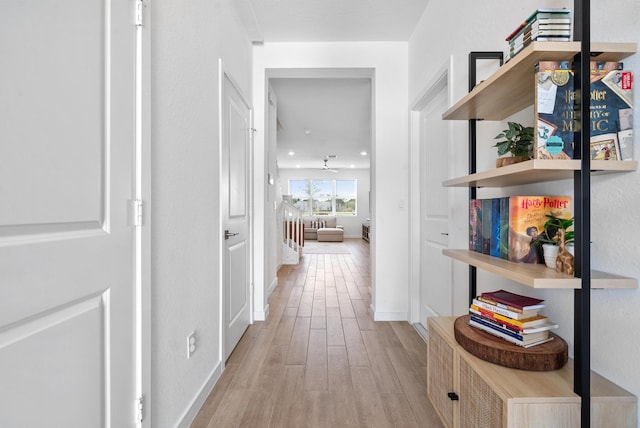 hall featuring light hardwood / wood-style flooring