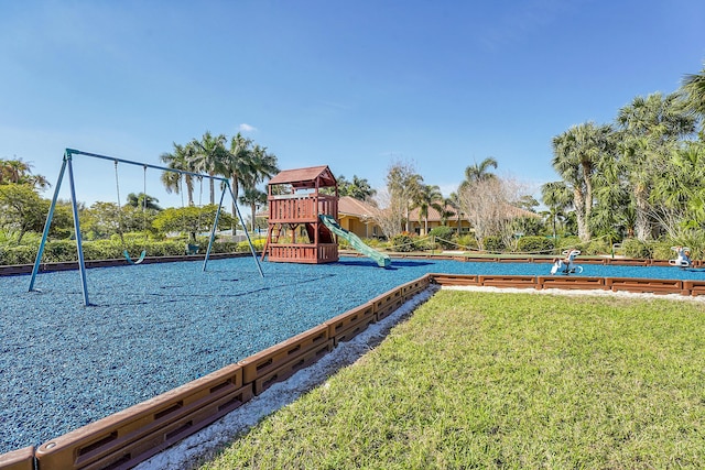 view of playground with a yard