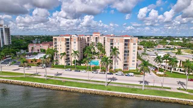 view of building exterior with a water view