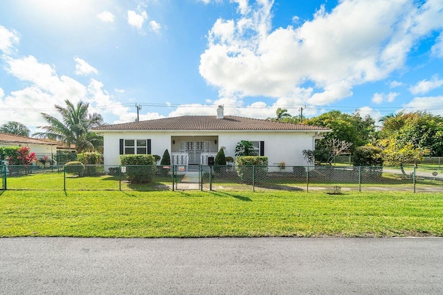 single story home with a front yard