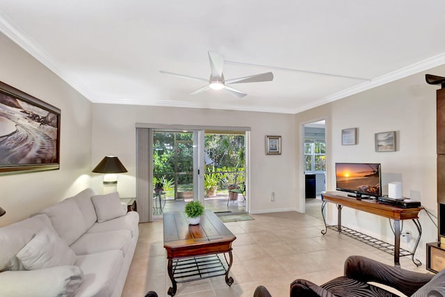 living room featuring ornamental molding, light tile patterned floors, and ceiling fan