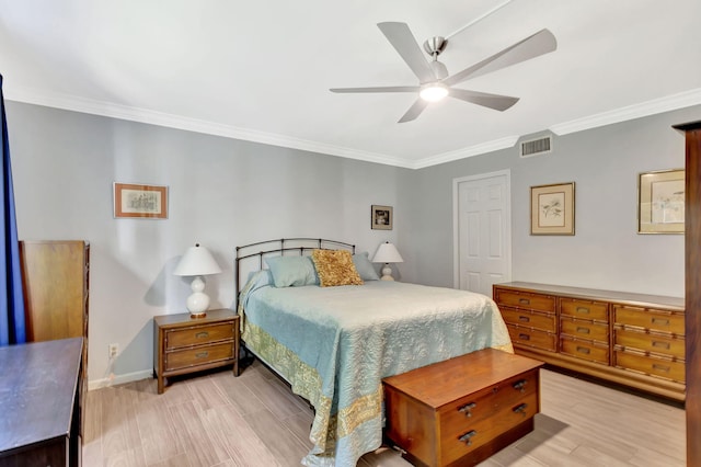 bedroom featuring ornamental molding, light hardwood / wood-style floors, and ceiling fan