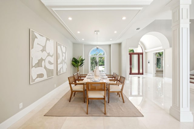 dining area with ornate columns