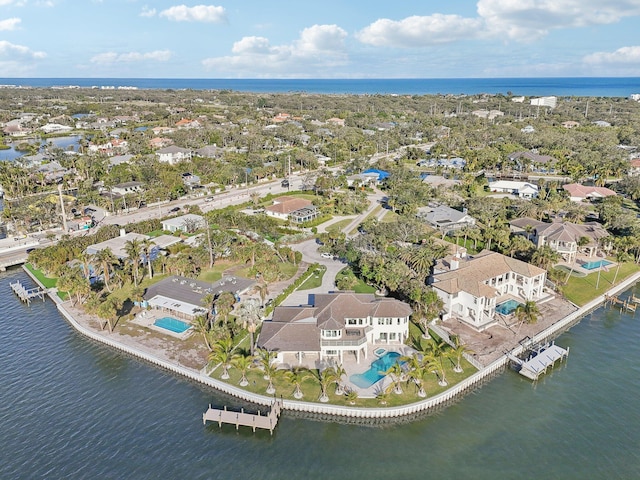 bird's eye view with a water view