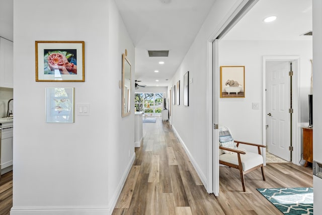 hall featuring light hardwood / wood-style flooring