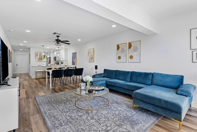 2825 SW 13th St Unit 204, Delray Beach, FL 33445 - living room featuring ceiling fan, wood finished floors, and recessed lighting