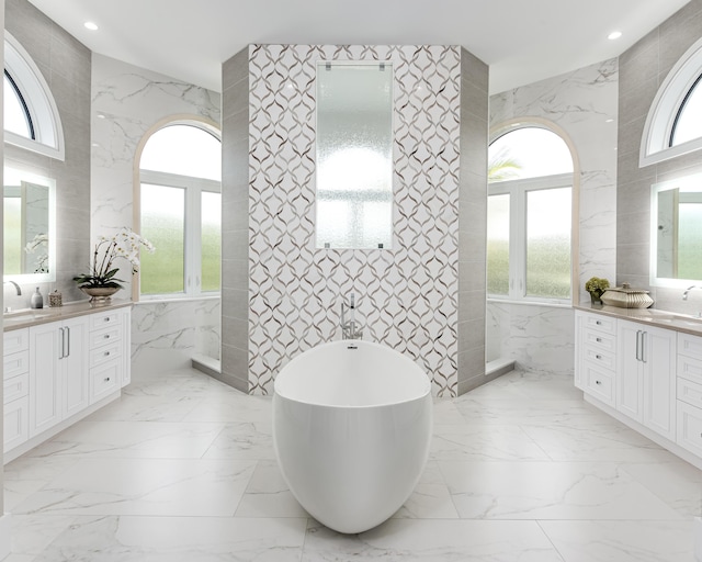 bathroom featuring tile walls and a tub