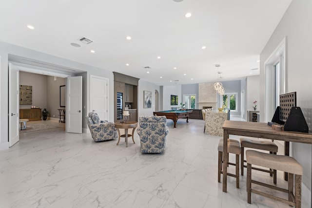 living room featuring pool table