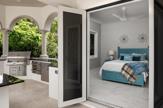 bedroom featuring decorative columns