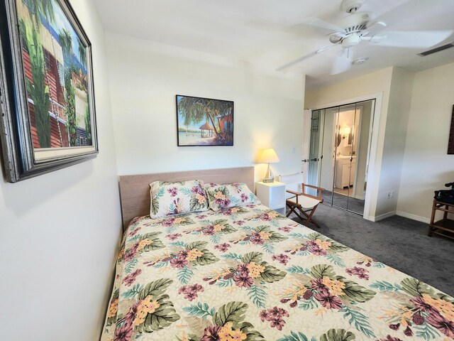 bedroom featuring dark colored carpet and ceiling fan