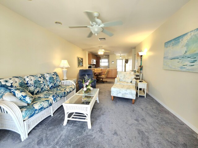 sunroom / solarium featuring a water view