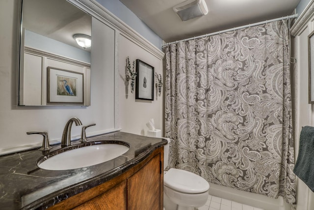 bathroom with vanity, toilet, and a shower with shower curtain