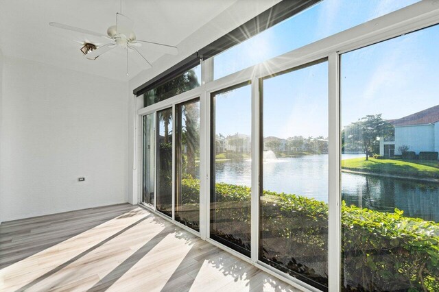 unfurnished living room with light carpet and a textured ceiling