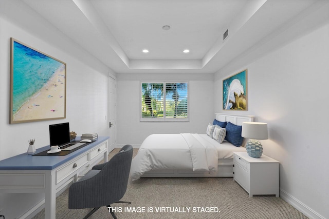 bedroom featuring light colored carpet, baseboards, a raised ceiling, and recessed lighting