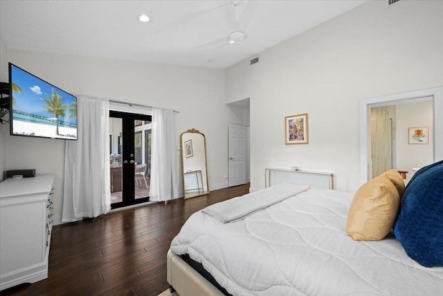 bedroom with recessed lighting, wood finished floors, visible vents, access to exterior, and french doors